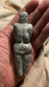Goddess carving grey marble